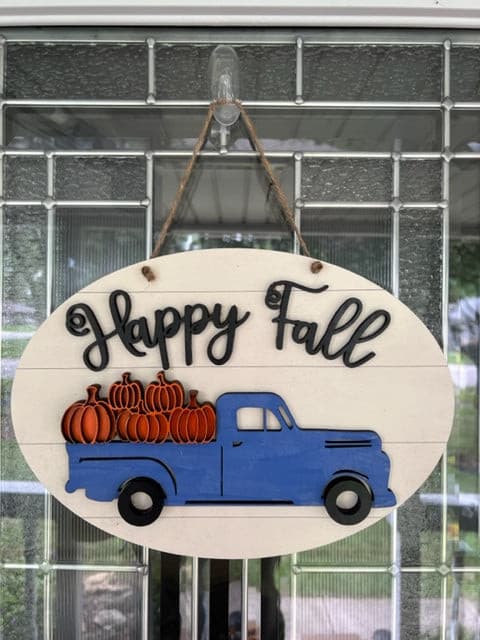 Welcome guests to your home this fall with this Happy Fall sign sporting a vintage truck carrying pumpkins!