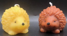 Load image into Gallery viewer, What could be cuter than a Hedgehog Beeswax Candle? Two! We offer these adorable Hedgehog Beeswax Candles standing upright or on the ground. This very detailed candle is sure to delight the hedgehog lovers in your life. Great for birthday gifts, fall decorating, housewarming gifts or Christmas gifts.
