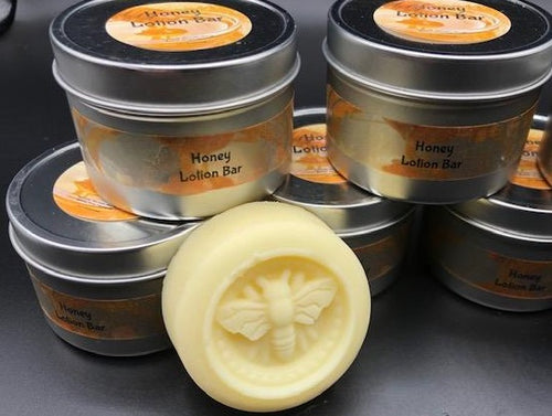 Adorable beeswax and honey lotion bar in a honey bee shape. Handmade in the USA. These handy lotion bars are great when you're on the go or for everyday use! Natural body heat slightly melts a bit of the lotion onto your hands. Great for elbows and dry areas. It leaves your skin feeling smooth and hydrated. The beeswax adds a barrier of protection that keeps the lotion where you put it longer. Great for Valentine's Day gifts, bridal party gifts, bridal showers, baby showers, or gifts for friends.