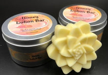 Load image into Gallery viewer, Adorable beeswax and honey lotion bar in a honey bee shape. Handmade in the USA. These handy lotion bars are great when you&#39;re on the go or for everyday use! Natural body heat slightly melts a bit of the lotion onto your hands. Great for elbows and dry areas. It leaves your skin feeling smooth and hydrated. The beeswax adds a barrier of protection that keeps the lotion where you put it longer. Great for Valentine&#39;s Day gifts, bridal party gifts, bridal showers, baby showers, or gifts for friends.

