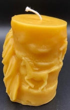 Load image into Gallery viewer, Horse design surrounds this all natural beeswax candle. Horse head on the front and wild horses running on the back side of the candle. Handmade in the USA.
