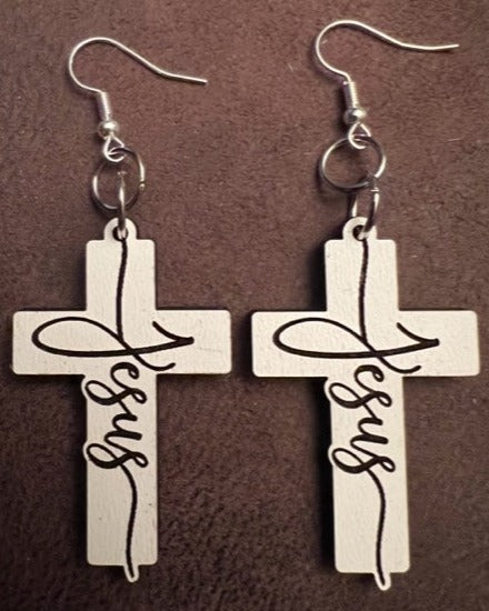 our stunning Cross Dangle Earrings with the word 