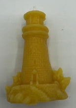 Load image into Gallery viewer, Lighthouse design all natural beeswax candle. Handmade in the USA. This Lighthouse beeswax candle takes you back to the sea &amp; promises to bring images of the seashore to your dreams. Perfect for nautical or coastal themed decor or as a gift to the beach lover in your life. Allow this stunning candle to envelop your room in a warm glow with a sweet honey aroma.
