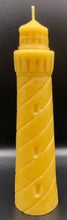 Load image into Gallery viewer, Evoke the beauty of the beach all year long with my 100% beeswax Lighthouse candle. This candle would look great in a nautical themed living space or even a home office. When lit, each candle emits the rich scent of honey and gives off an alluring glow. Perfect as a gift for the beach lover in your life. Bring a bit of the sea to them!
