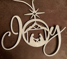 Load image into Gallery viewer, This beautiful Nativity Scene ornament set in the word &#39;JOY&#39; is sure to bring the true meaning Christmas to your Holiday decor this year.  Also makes a perfect gift or for gift exchanges.
