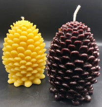 Load image into Gallery viewer, Settle into fall with this pinecone beeswax candle! Made with pure beeswax, this decorative candle makes for perfect fall decor, front porch decor, a housewarming gift, or even a nice choice for some fall wedding decor! Homemade candles are sure to add some charm and create a warm atmosphere in your space. When burned, this candle leaves a wonderful and natural hint of a sweet honey aroma -- completely natural! No fragrance added. Just as nature intended :)
