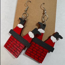 Load image into Gallery viewer, These funny Santa Stuck in the Chimney Earrings are sure to add Christmas cheer to any outfit!  Incredible for your ugly sweater party.
