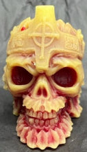 Load image into Gallery viewer, This creepy skull with cross crown beeswax candle is sure to be a hit with your goth or Halloween loving friends.  Adds the perfect touch to Halloween decor.  This cryptic, gothic candle is great for Halloween decorations, gifts for skull loving friends, gothic decor, fall decor or just scary decor.  
