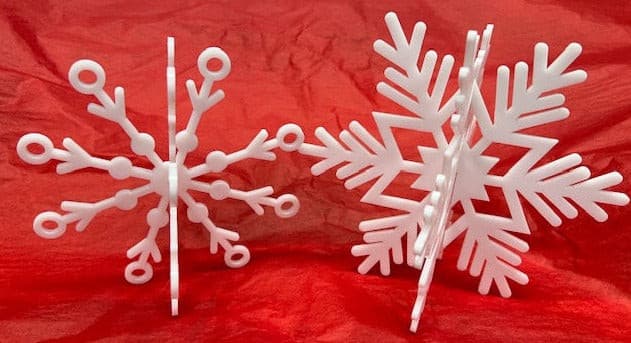 These laser cut 3D snowflakes come in two parts for easy storage.  Simply slip the two pieces together & hang from the ceiling or set out for table decor.  A great addition to your Holiday, Christmas or winter display.  Made out of 1/8