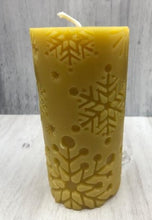 Load image into Gallery viewer, Beautiful Snowflake designs glow when you light this amazing Snowflake Beeswax Pillar Candle.  Also available in a 3&quot; version.
