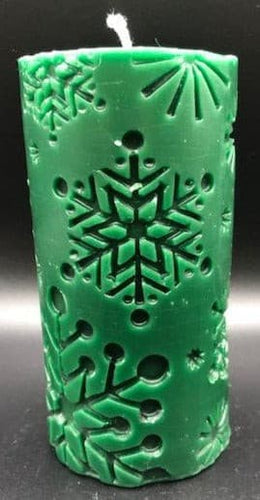 beautiful winter snowflake pillar; the perfect addition to your winter decor.  Snowflakes adorn the sides of this charming candle.  Nothing reminds us more of winter & the holidays like a cool night while seeing flickering candles adorning our home. It will be sure to add a little Christmas spirit to whatever room you put it in.  Great as a Christmas gift or to add to your winter decor.  Pick up the spirits of a loved one by lighting up their life with this Snowflake beeswax pillar candle.