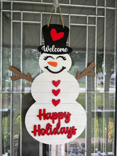 Load image into Gallery viewer, Let this adorable Snowman or Snowwoman Door Hanger welcome your guest this winter.
