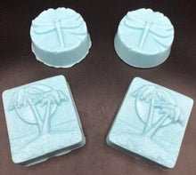 Load image into Gallery viewer, Ocean themed designs for our Ocean Breeze scented soaps. Blue palm trees by the beach and dragonfly designs pictures. Fresh ocean breeze scent takes you right back to the tropics as it soothes &amp; cleanses your skin. The moisturizing oils used in our soaps produce a rich luxurious lather that leaves your skin clean &amp; soft without stripping the natural oils. Perfect for Valentine&#39;s Day gifts, Christmas gifts, birthday gifts, wedding shower gifts, Mother&#39;s Day gifts &amp; more!
