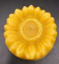 Load image into Gallery viewer, Adorable Sunflower shaped beeswax candle. This bright and cheery beeswax candle is sure to brighten everyone&#39;s day. A slight shimmer of gold mica in the center adds a touch of whimsey to this summer favorite.
