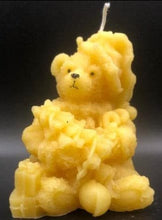 Load image into Gallery viewer, This sweet Teddy Bear Beeswax Candle holds a Christmas tree and has gifts stacked at his feet.  A beautiful addition to any holiday or Christmas decor.
