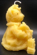 Load image into Gallery viewer, This sweet Teddy Bear Beeswax Candle holds a Christmas tree and has gifts stacked at his feet.  A beautiful addition to any holiday or Christmas decor.  Side view
