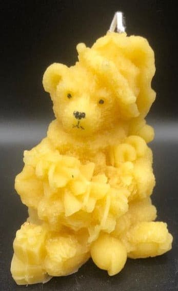 This sweet Teddy Bear Beeswax Candle holds a Christmas tree and has gifts stacked at his feet.  A beautiful addition to any holiday or Christmas decor.