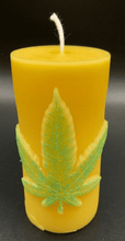 Load image into Gallery viewer, Leaf design beeswax candle.  Leaf design on front of this candle shown with green sparkle mica leaf.
